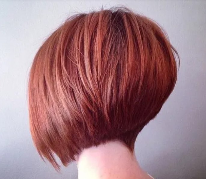14. Red asymmetrical bob cut for short hair
