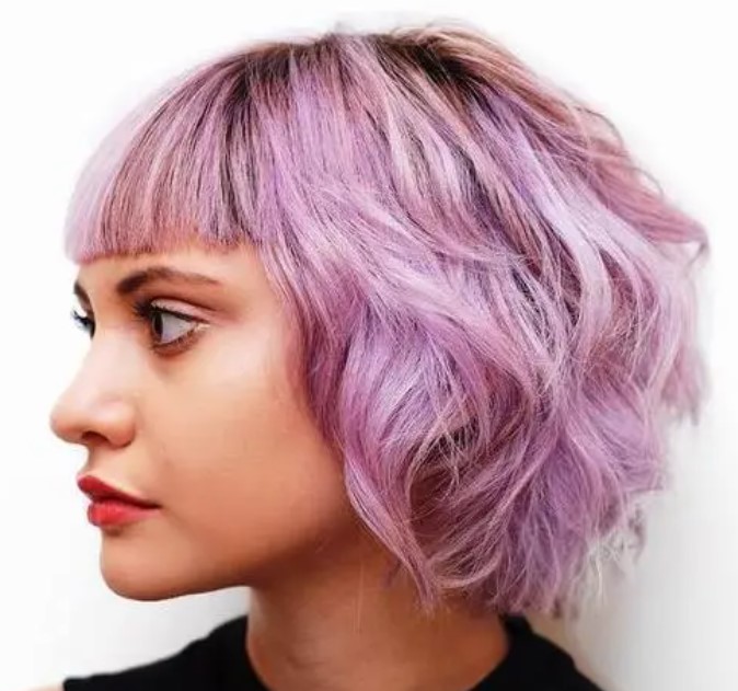 17. Pink Bubblegum Shaggy Bob Haircut with Blunt Bangs for Short Hair