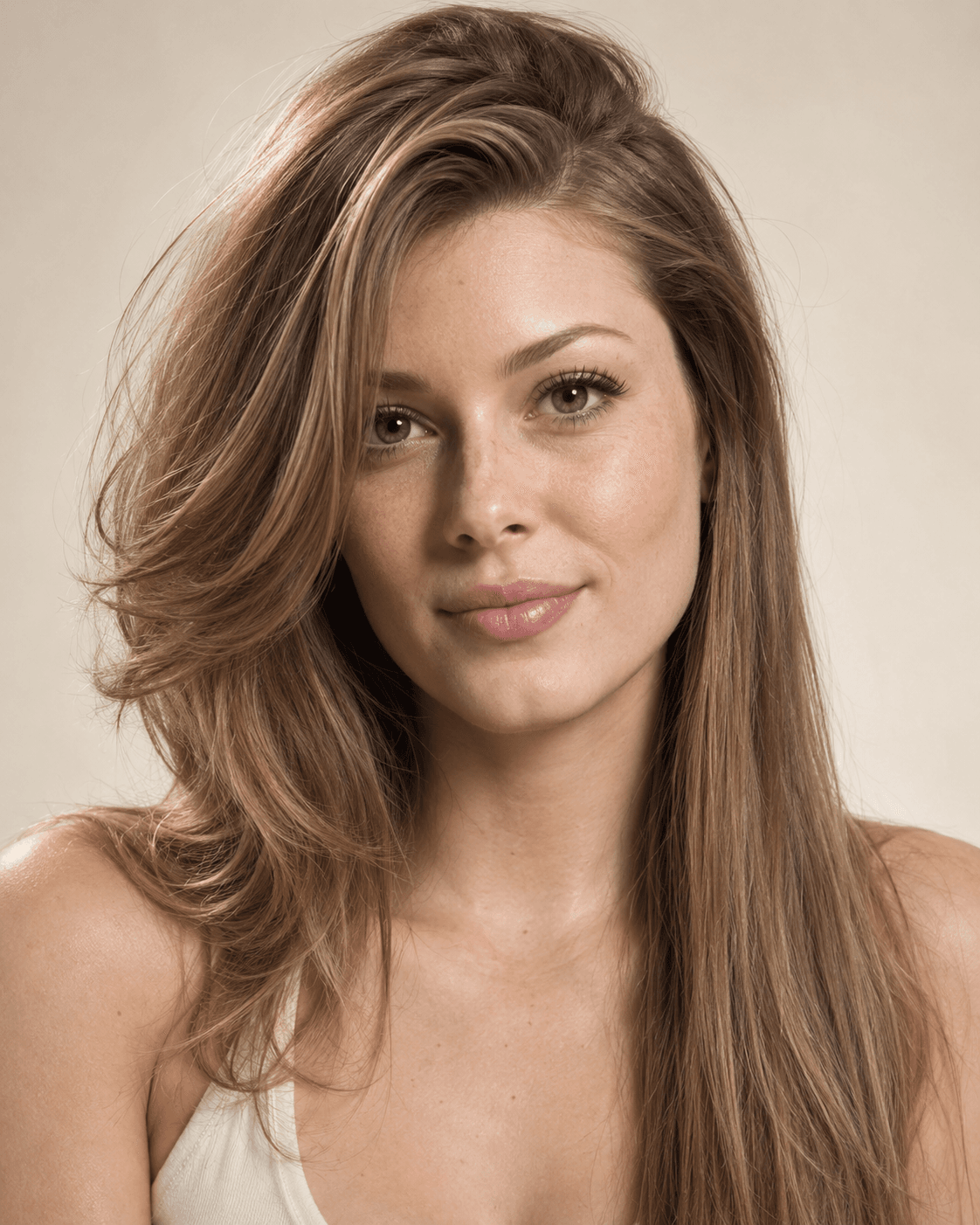 Long hair styled with a deep side part showing asymmetrical layered volume.